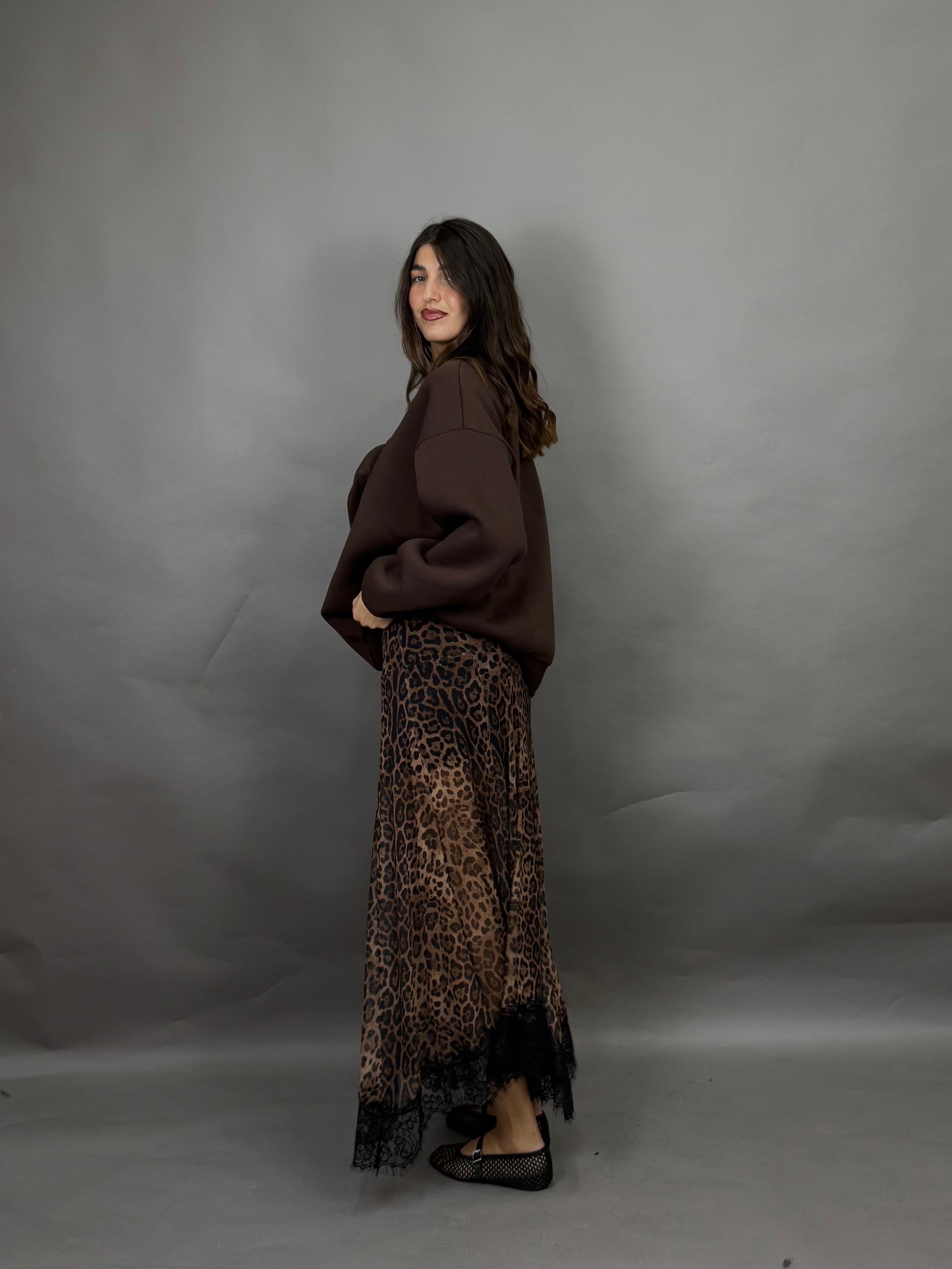 Gonna lumina maculato