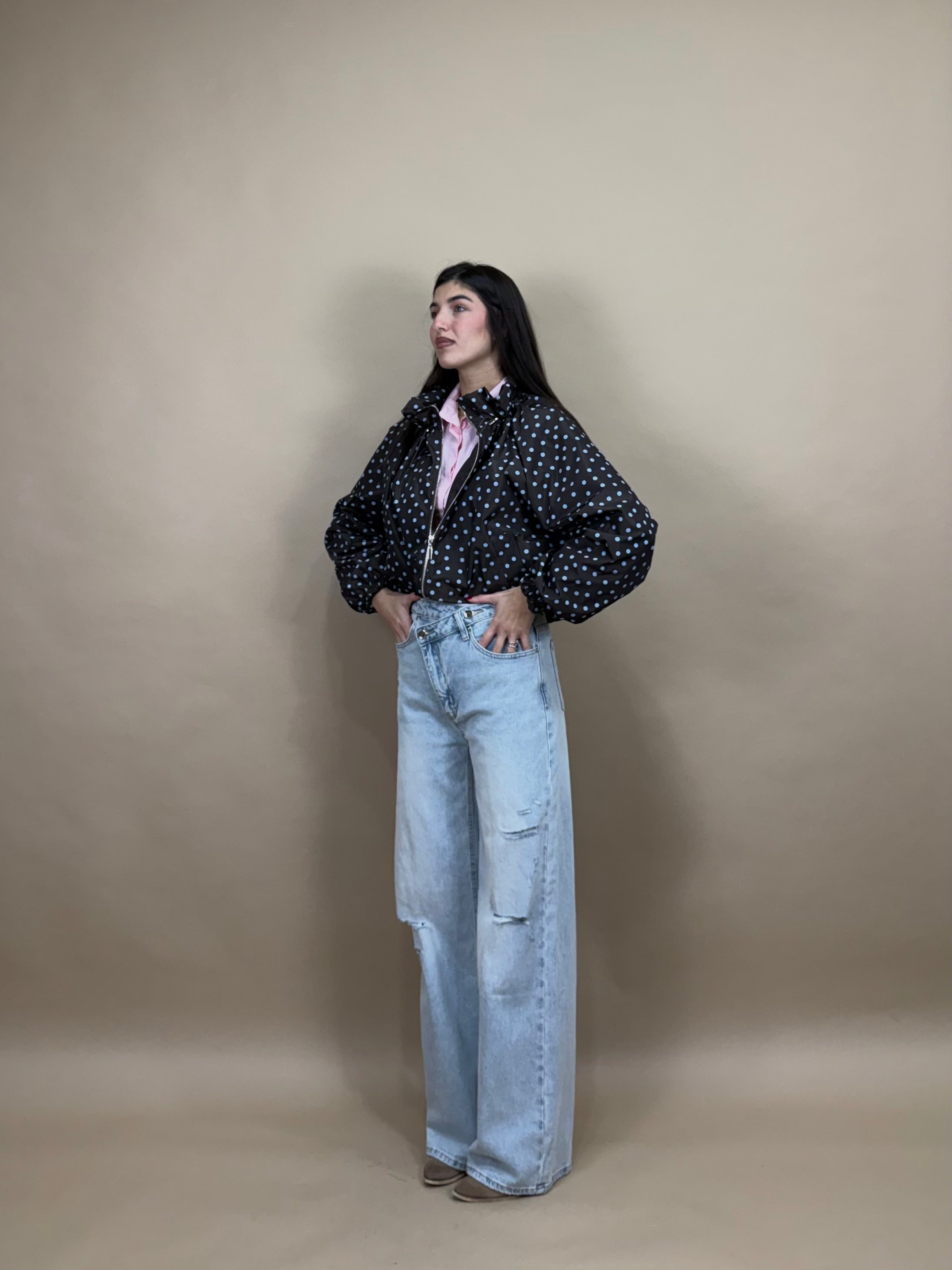 Jeans bottone storto