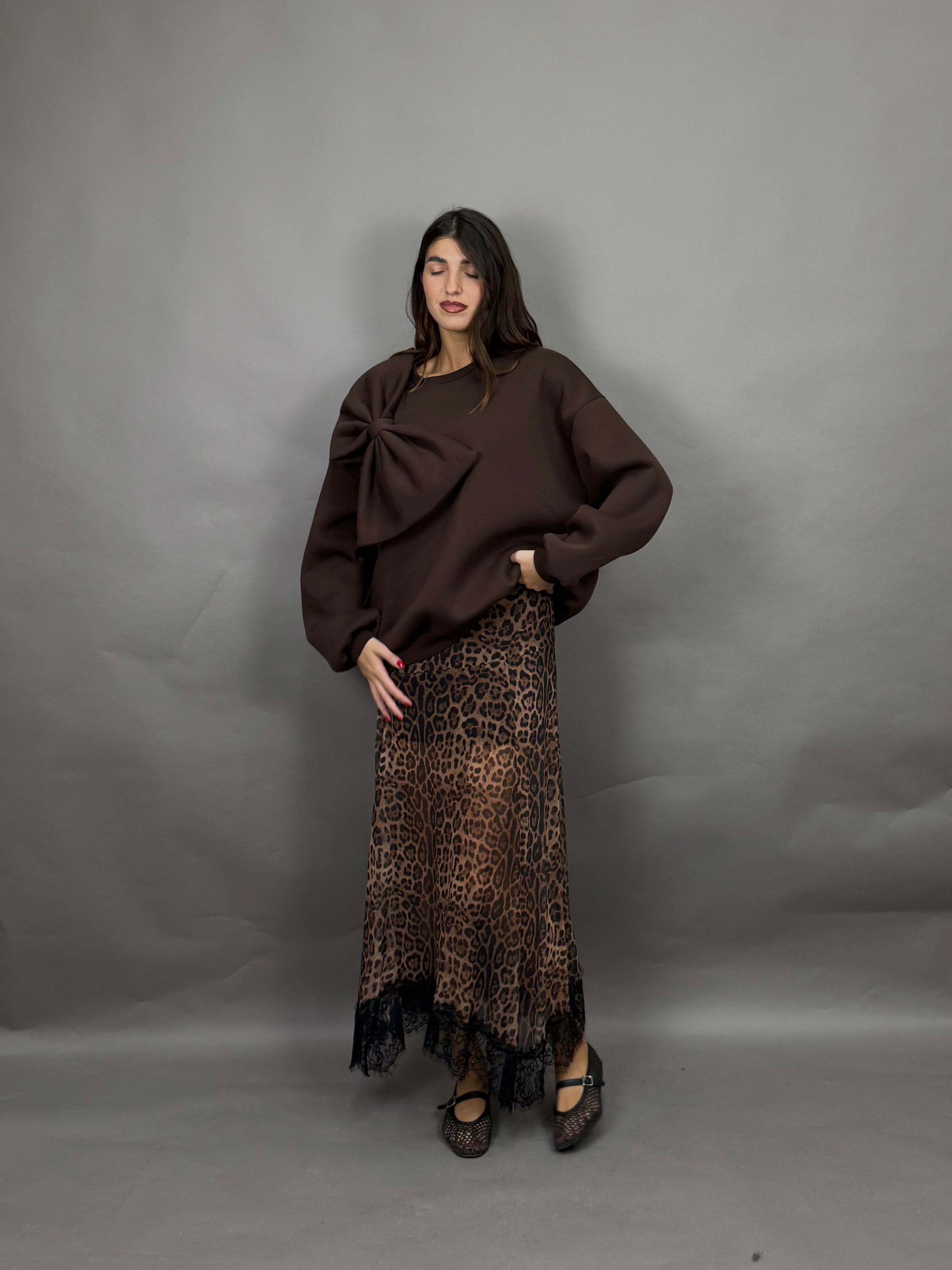 Gonna lumina maculato