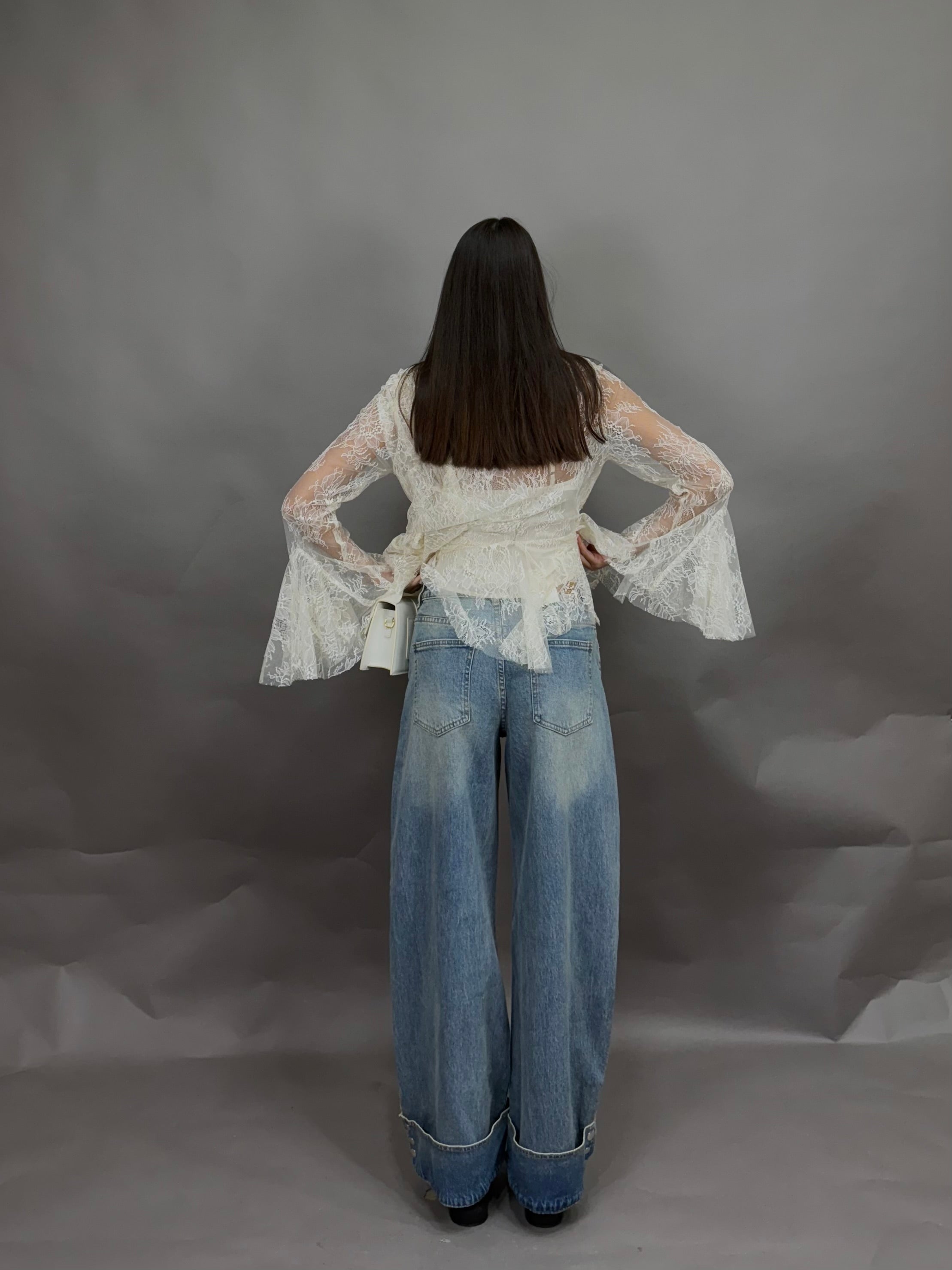 Jeans piegone bottoni