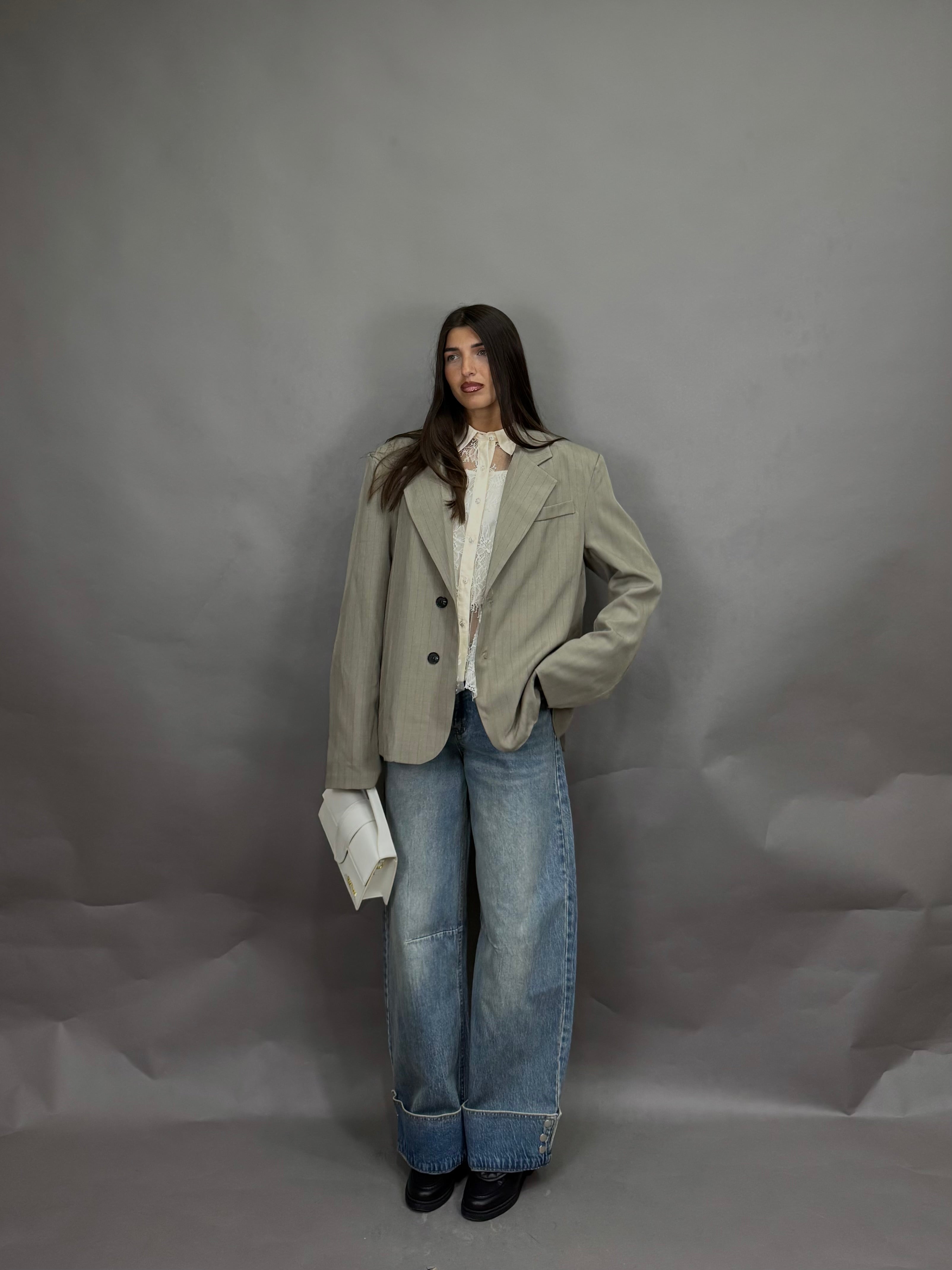 Jeans piegone bottoni