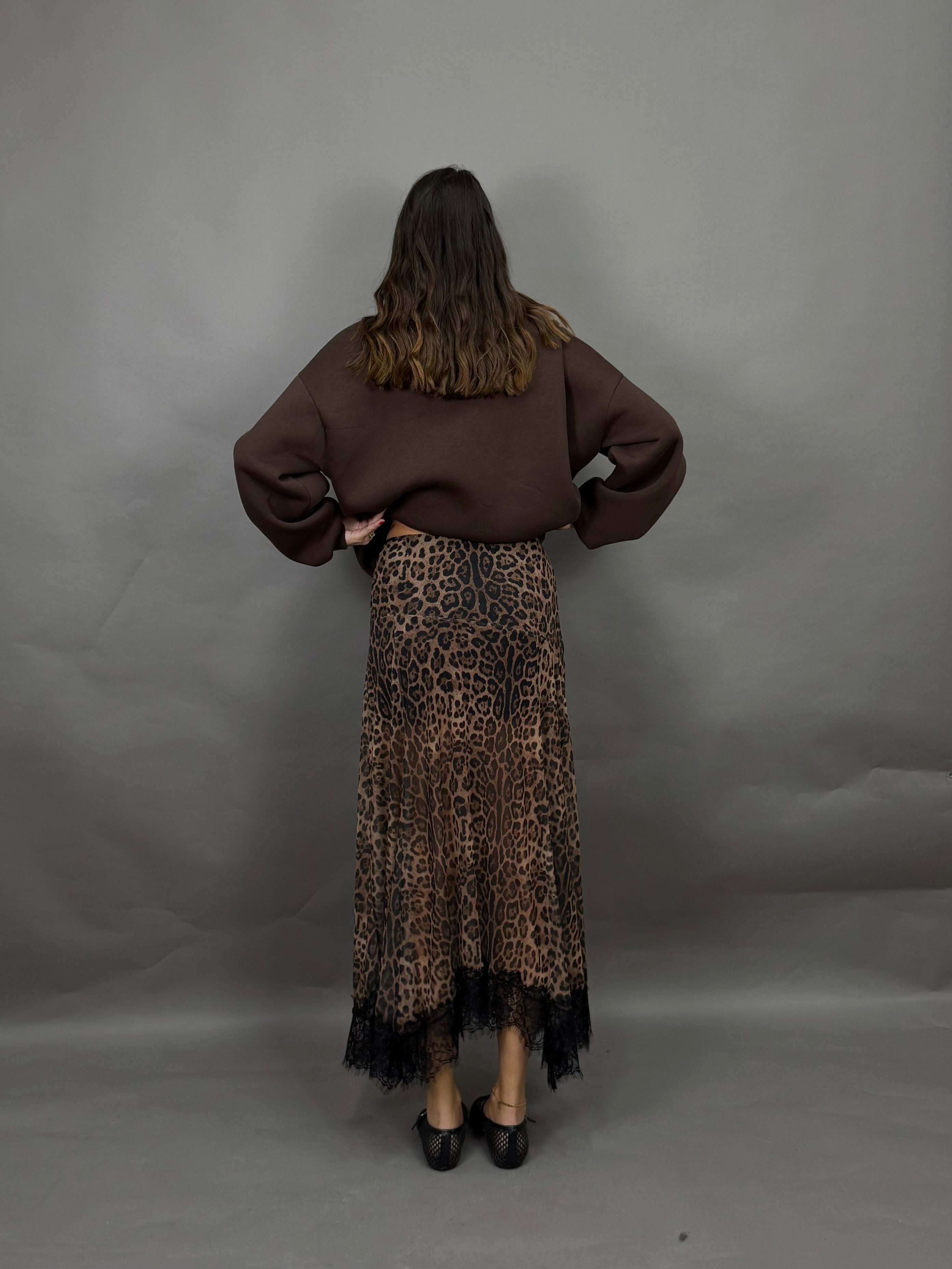 Gonna lumina maculato