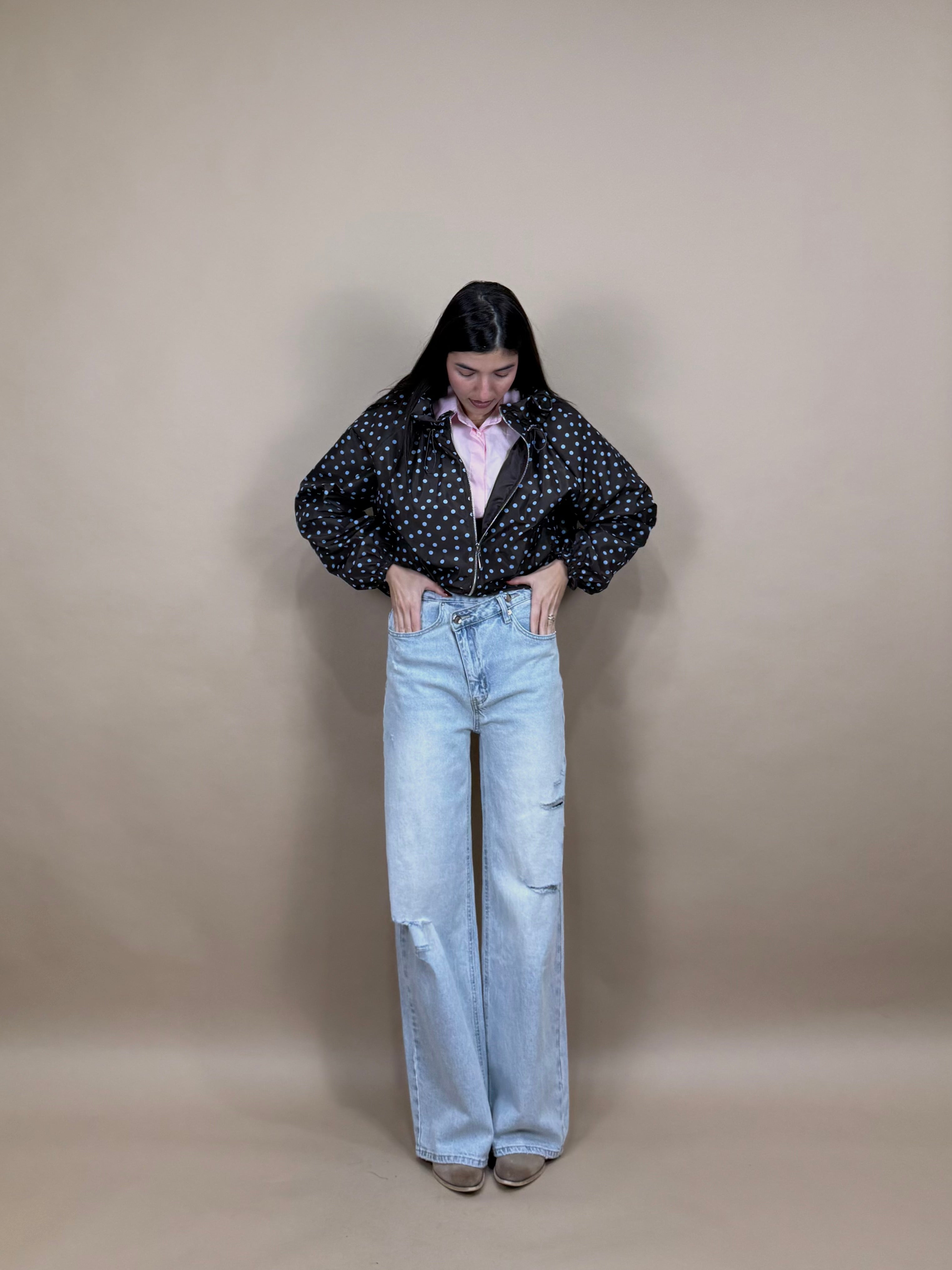 Jeans bottone storto