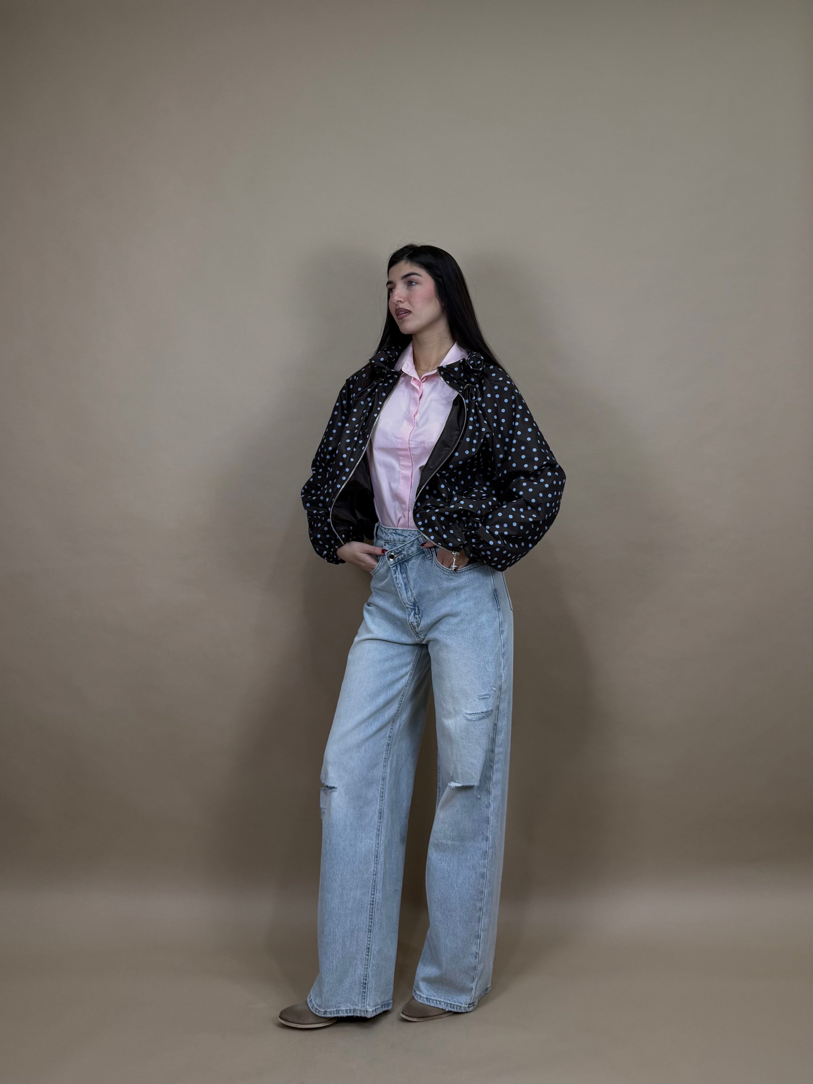 Jeans bottone storto