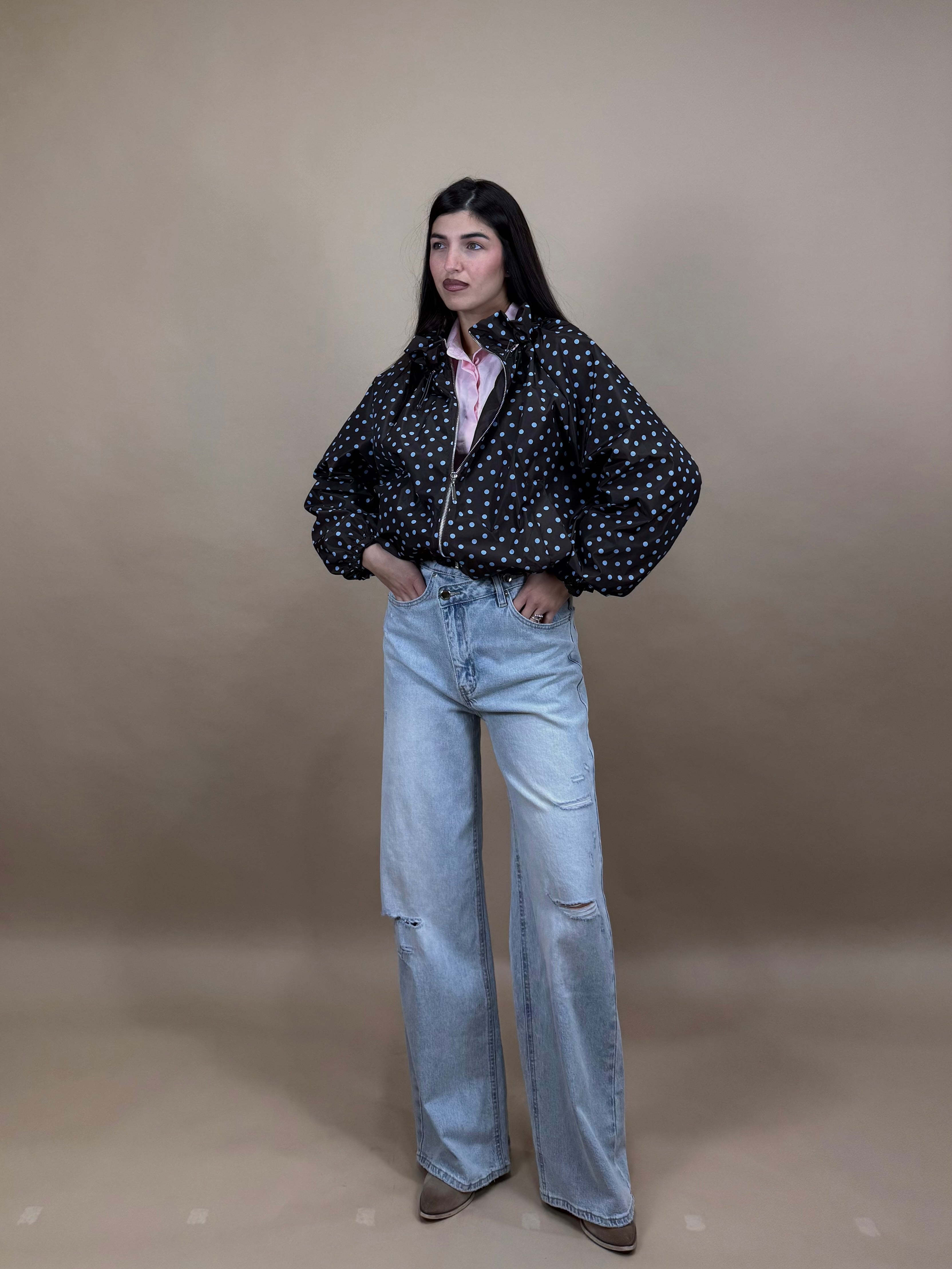 Jeans bottone storto