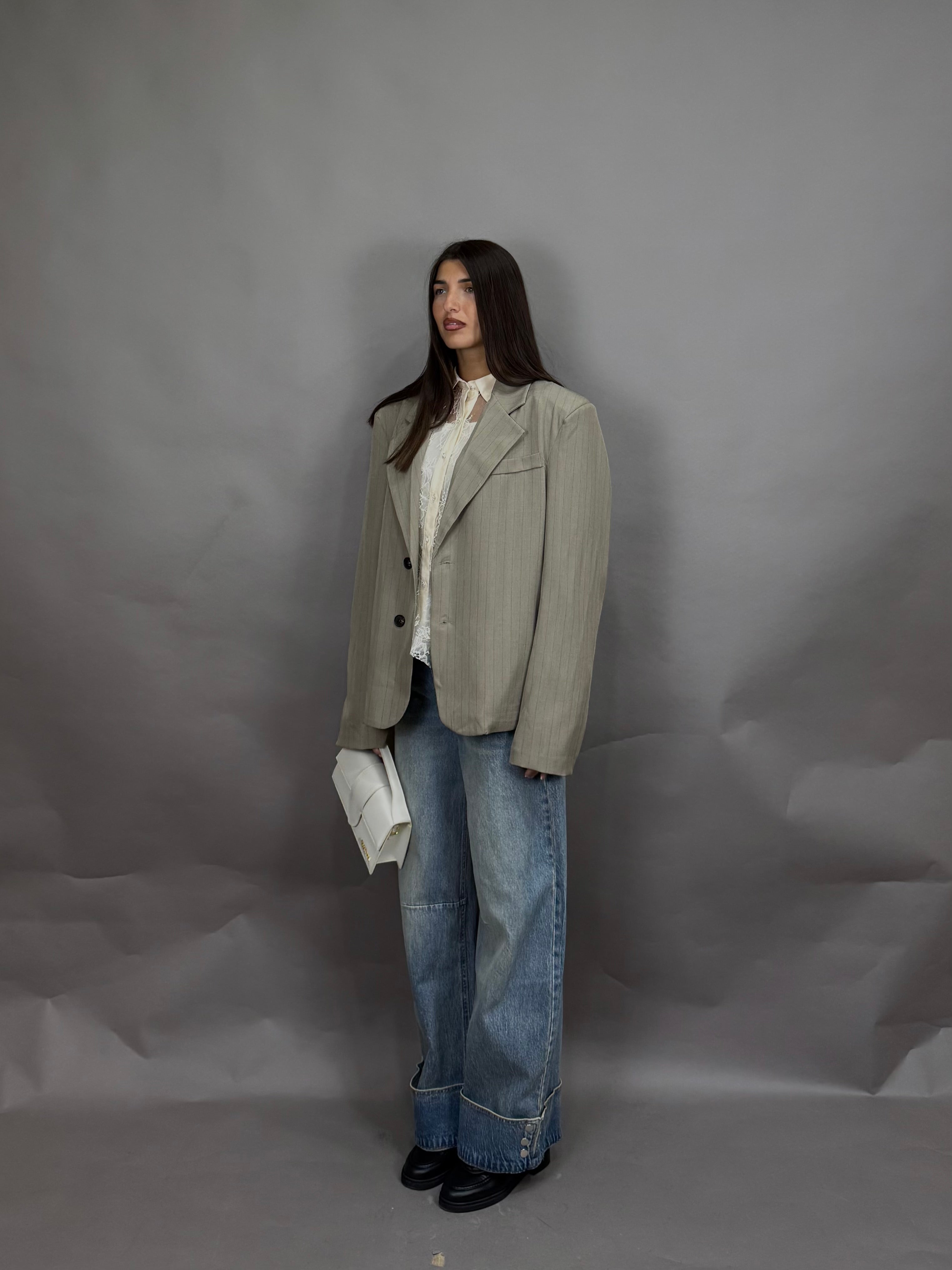 Jeans piegone bottoni