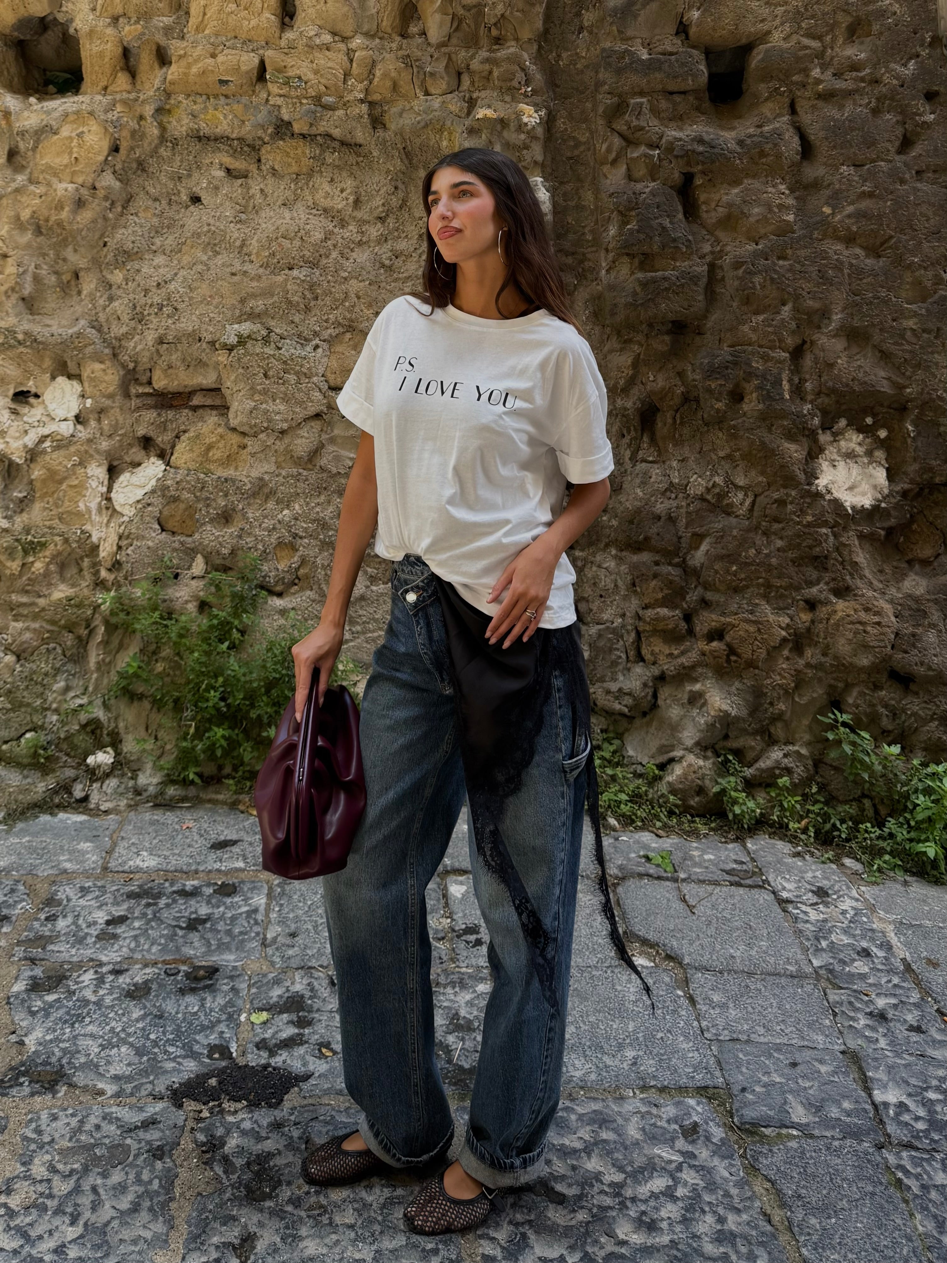 Jeans bottone storto