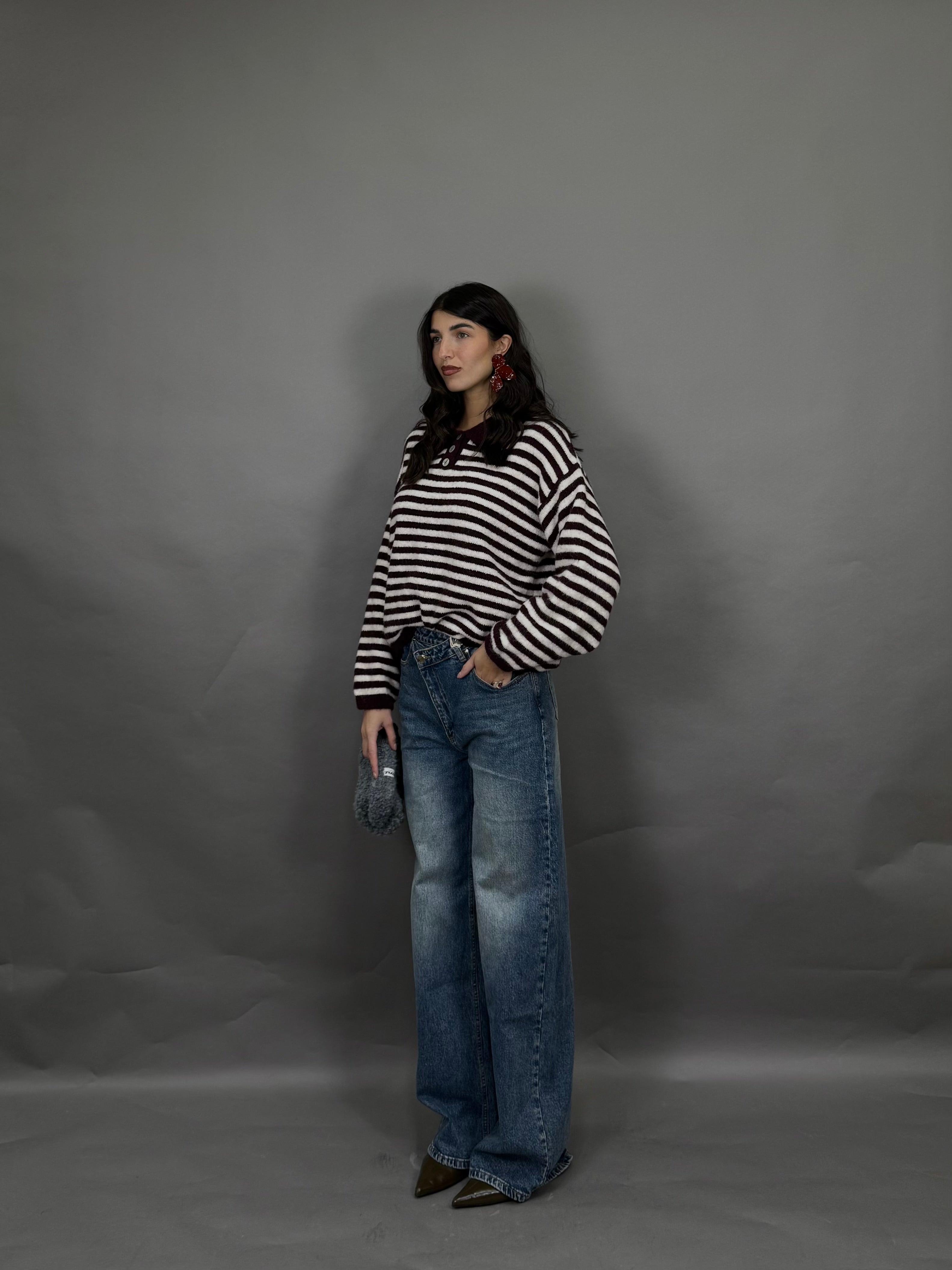 Jeans bottone storto