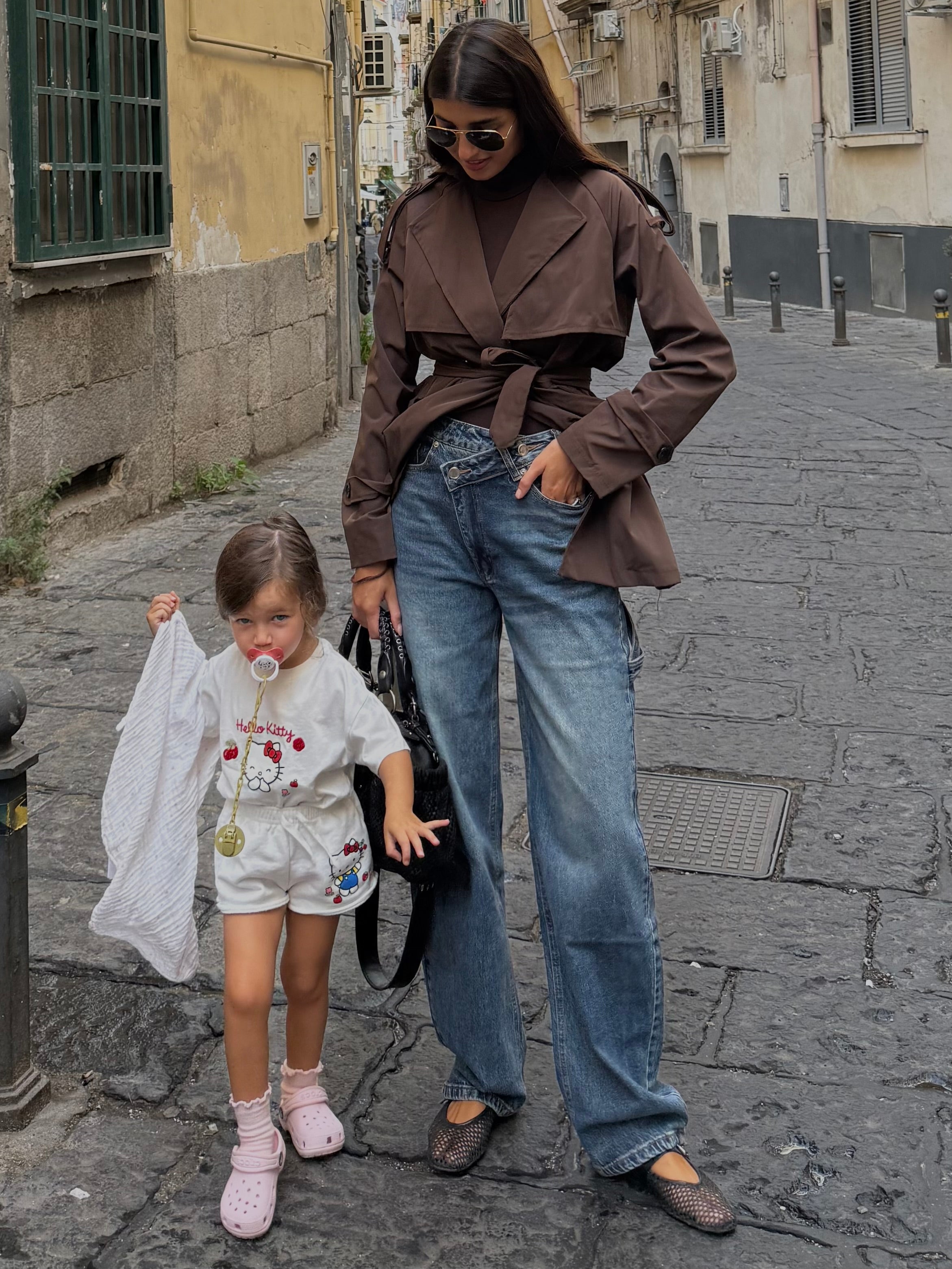 Jeans bottone storto