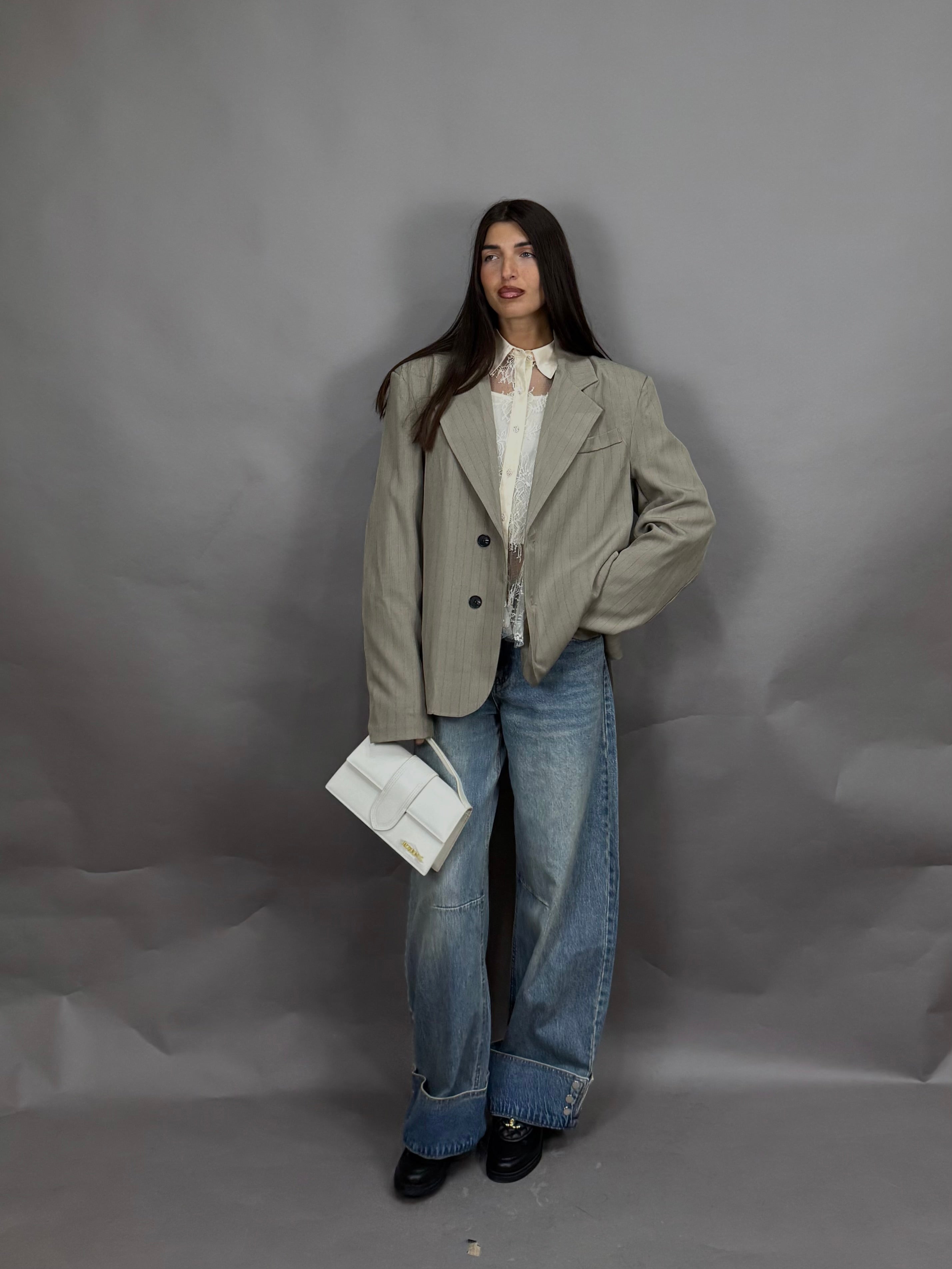 Jeans piegone bottoni