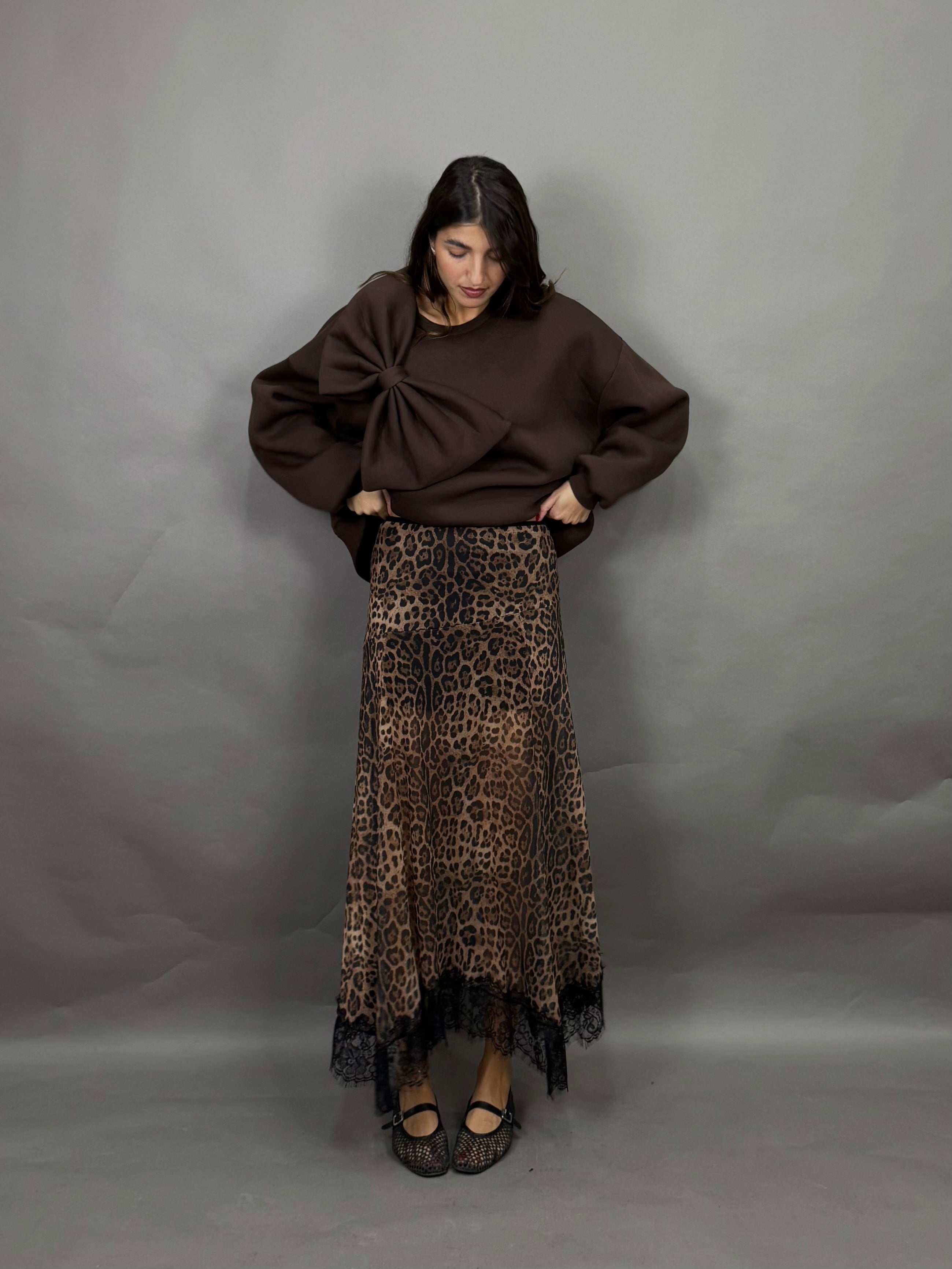 Gonna lumina maculato