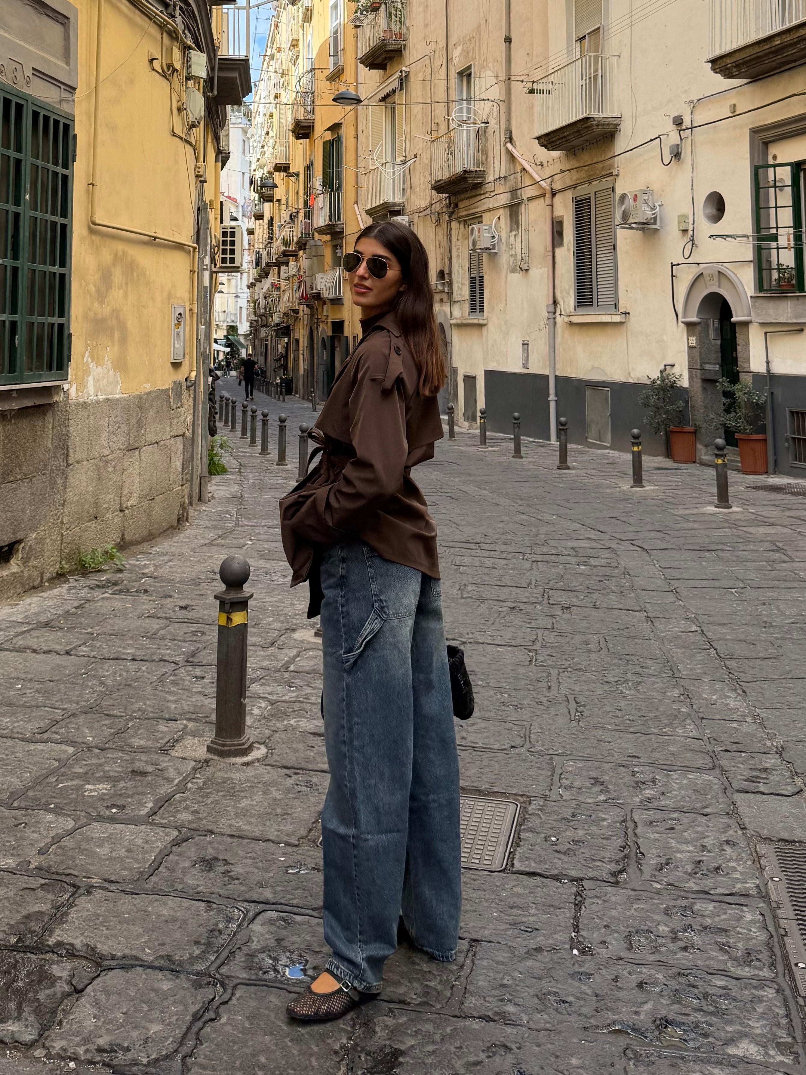 Jeans bottone storto